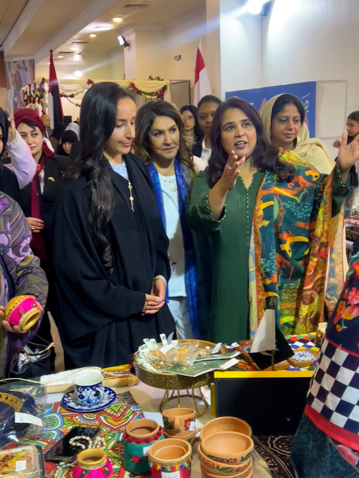 Shahmeen Islam presenting Pakistani crafts at a bazaar stall