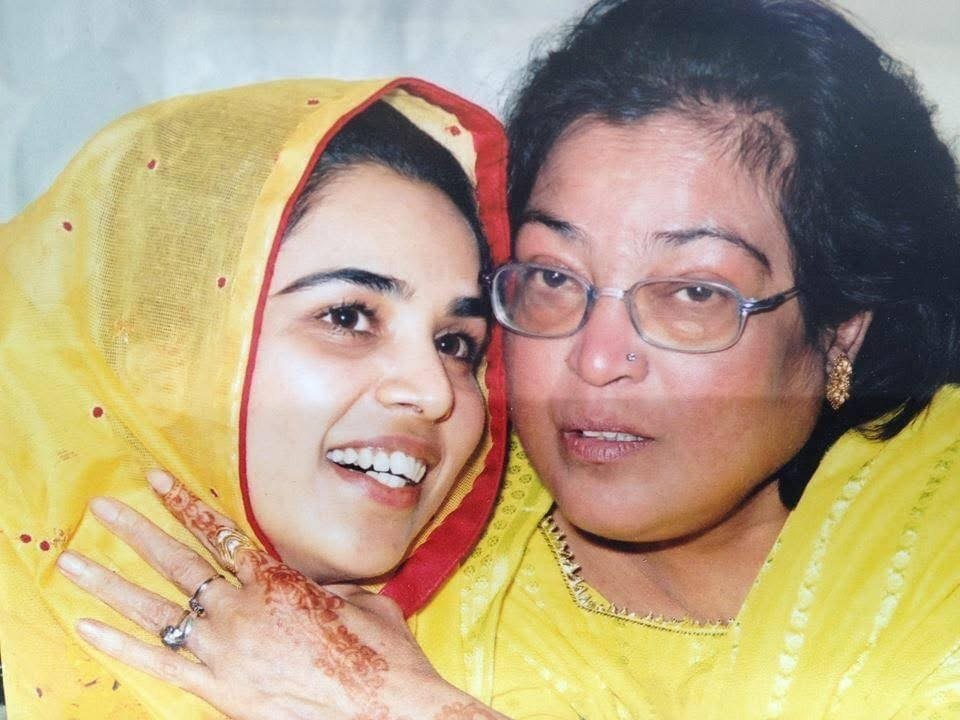 Shahmeen Islam as a young woman, embraced by her mother